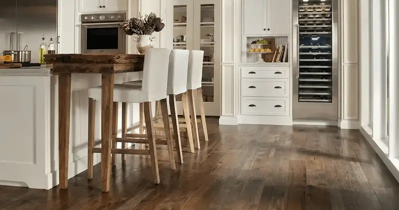 Professionally installed and refinished hardwood flooring in a residential home, showcasing smooth finish and natural wood tones in Rochester, NY